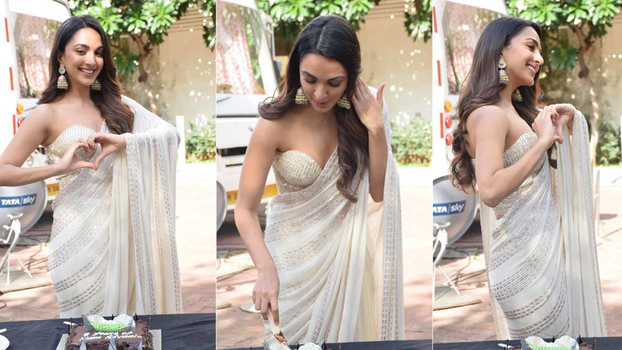 Kiara celebrates 8 years in Bollywood by cutting a cake in a stunning sari