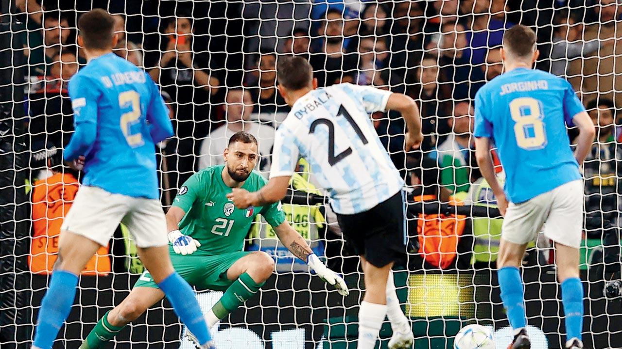 Argentina striker Paulo Dybala (centre) shoots to score their third goal against Italy at the Wembley Stadium in London on Wednesday. Pic/AFP
