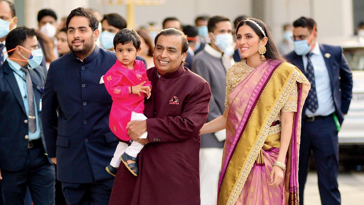 Mukesh Ambani with son Akash, daughter-in-law Shloka and grandson Prithvi at the Jio World Centre, BKC, on Sunday. Pics/Ashish Rane