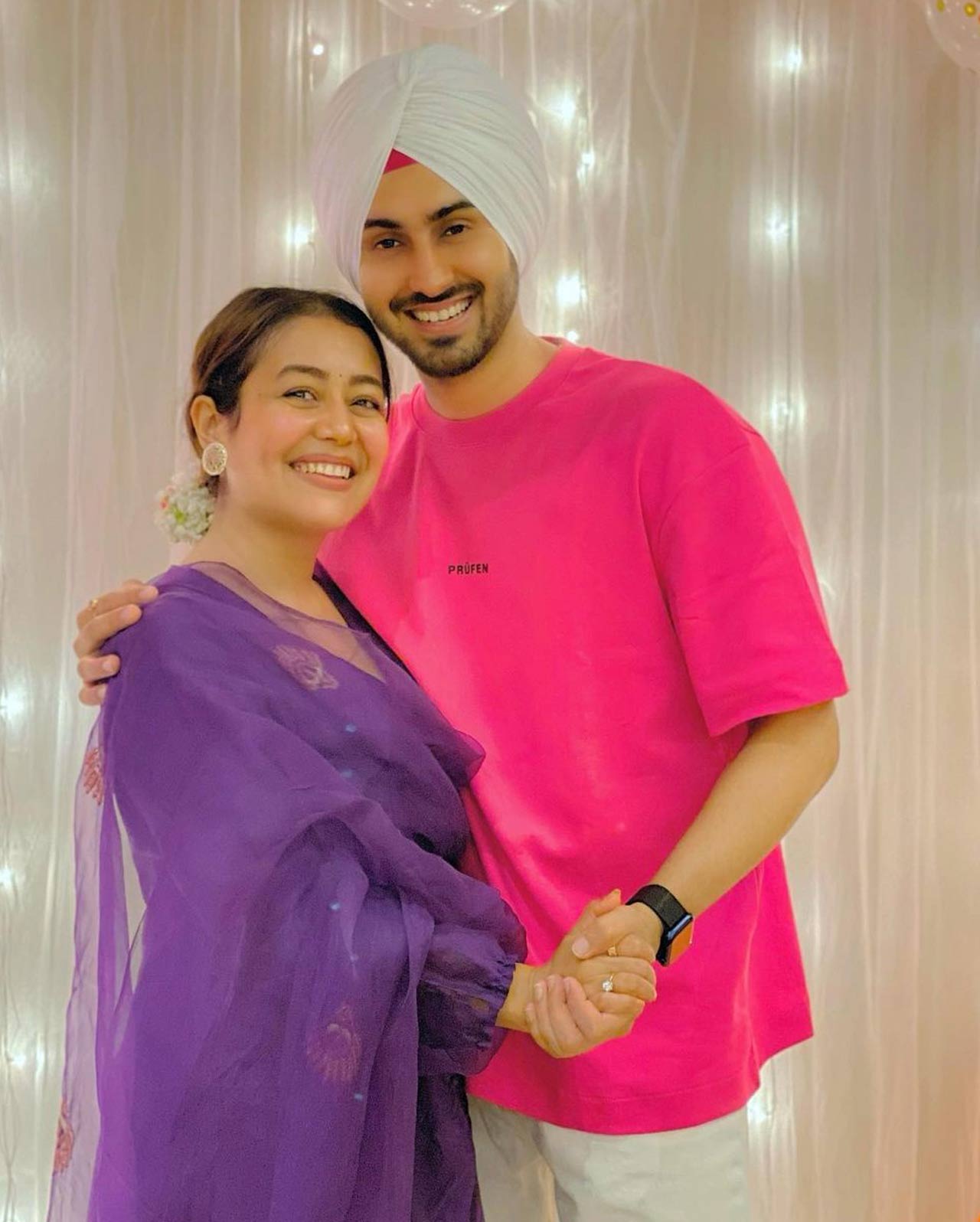 Neha Kakkar donned purple and Rohanpreet Singh wore pink and they posed for the occasion of Eid