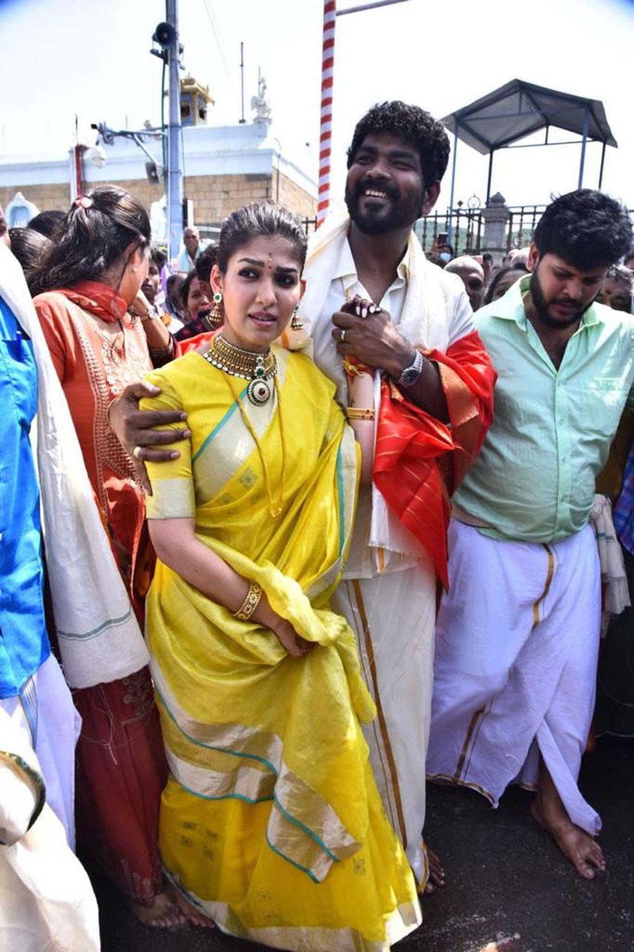 Vignesh Shivan tied the sacred 'Thali' around actress Nayanthara's neck at around 10.24 a.m. even as guests who had gathered for the wedding showered their blessings upon the newly wed couple. Sources said that the couple came down the stage after the wedding and took the blessings of actor Rajinikanth who was seated next to Shah Rukh Khan and director Mani Ratnam in the audience