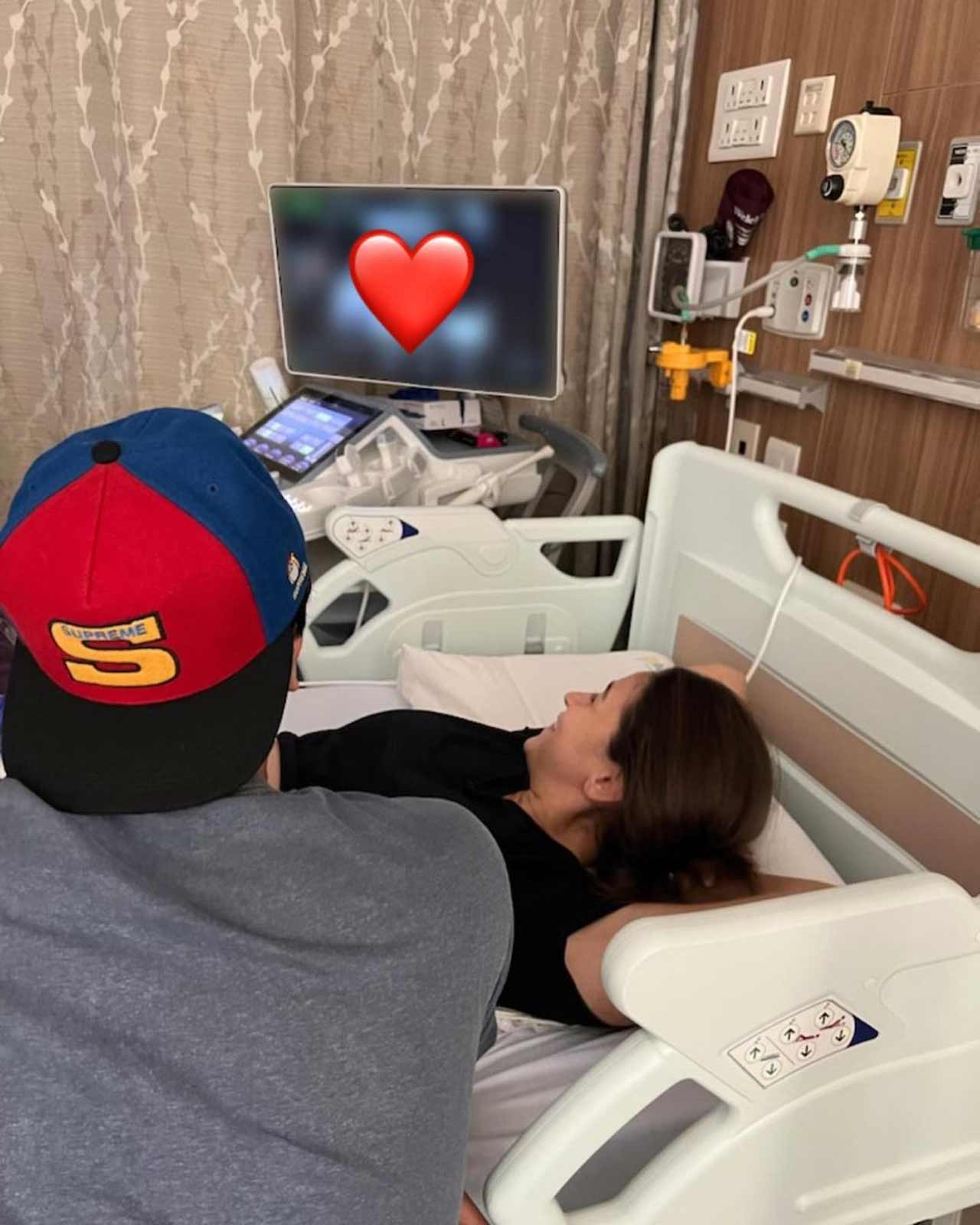 Alia Bhatt shared a picture, where the actress is seen getting her sonography done while her husband Ranbir is seen looking at the baby on the screen. She captioned the image: 
