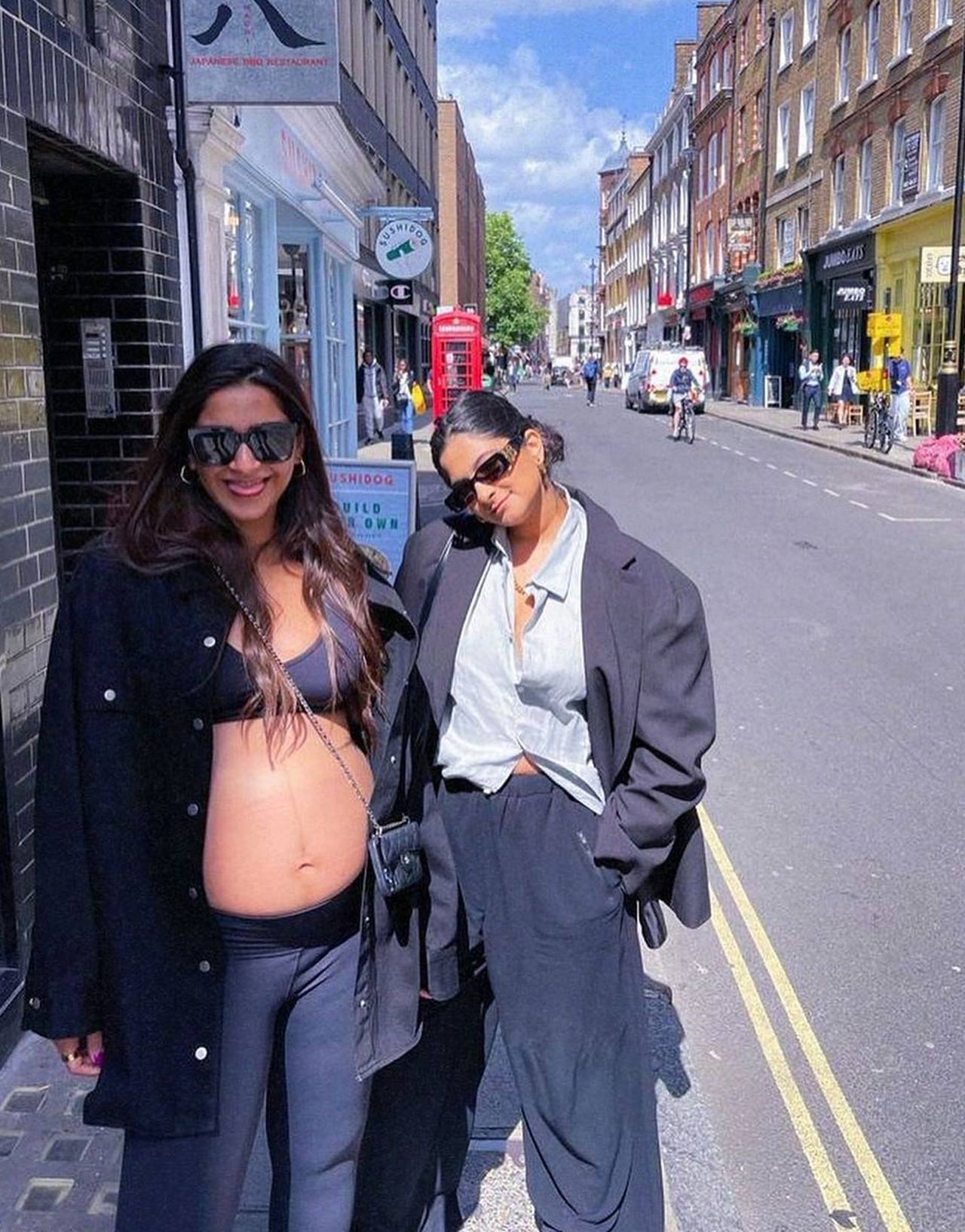 In this photo, Sonam can be seen flaunting her baby bump as she sported a black shirt and a long coat. On the other hand, Rhea wore a white shirt and blue pantsuit. The sisters twinned in cool black shades as they smiled and posed for the camera. Apart from that, she shared some pictures of food and travel