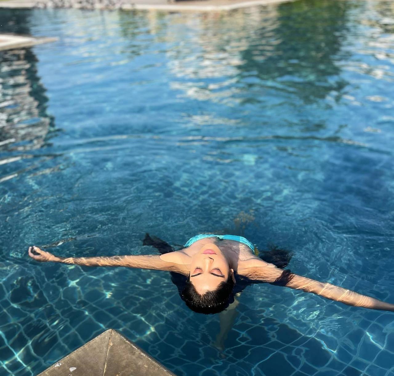 Aaditi S Pohankar enjoys her time in the pool in this picture and it seems she's taking her much-needed time off