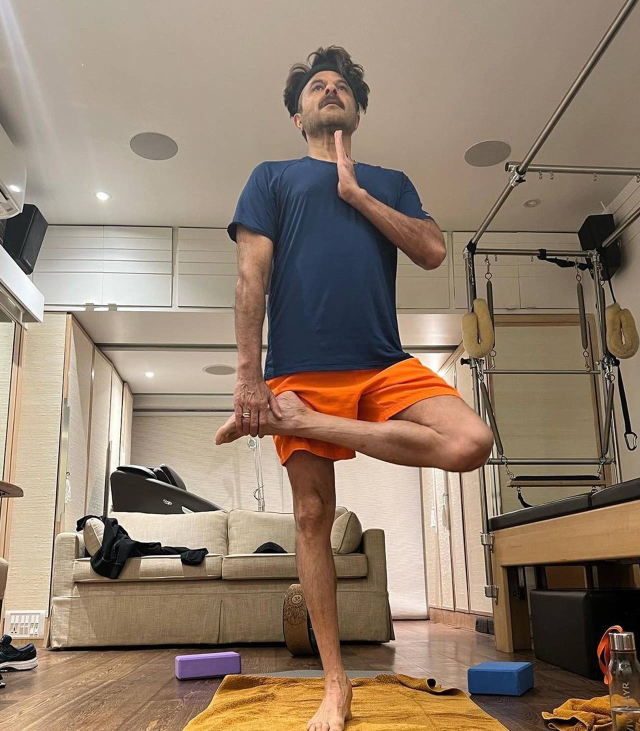 Anil Kapoor is also celebrating the event to the fullest, as he shares glimpses acing various yoga asanas on social media. On Tuesday, the 65-year-old actor who is well known for his timeless grooming secrets took to his Instagram handle and shared a series of images from his vanity van, as he could be seen performing yoga asanas and exercises. In the caption, Anil shared his secret to leading a happy and healthy life. He wrote, 