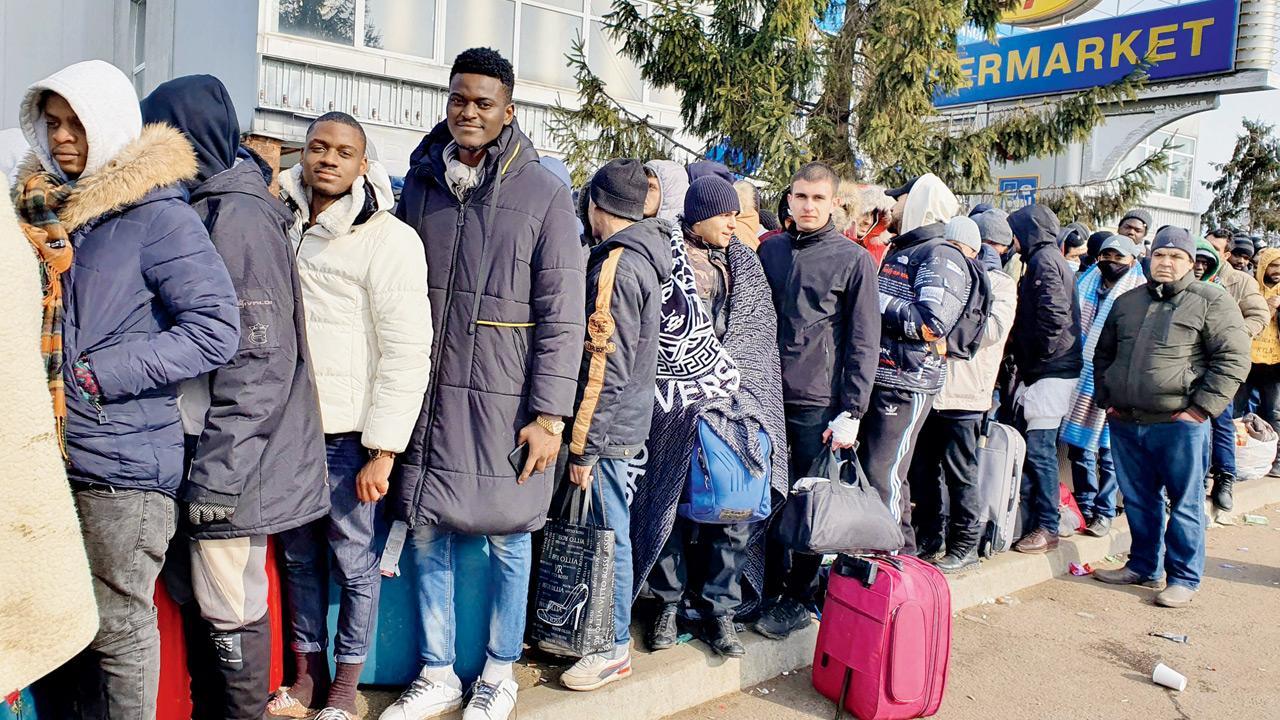 Students from Kharkiv march in group to escape