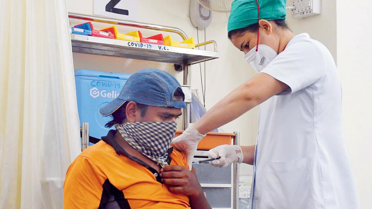 A year on, over 700 adults still coming for first dose daily