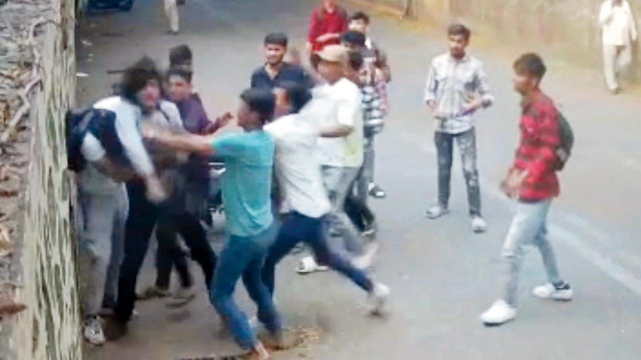 Screengrabs of CCTV camera footage of the assault outside KES Junior College of Arts and Commerce, Kandivli West