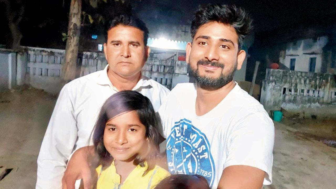 Mohammad Mehtab Raza (right) with his uncle and a cousin