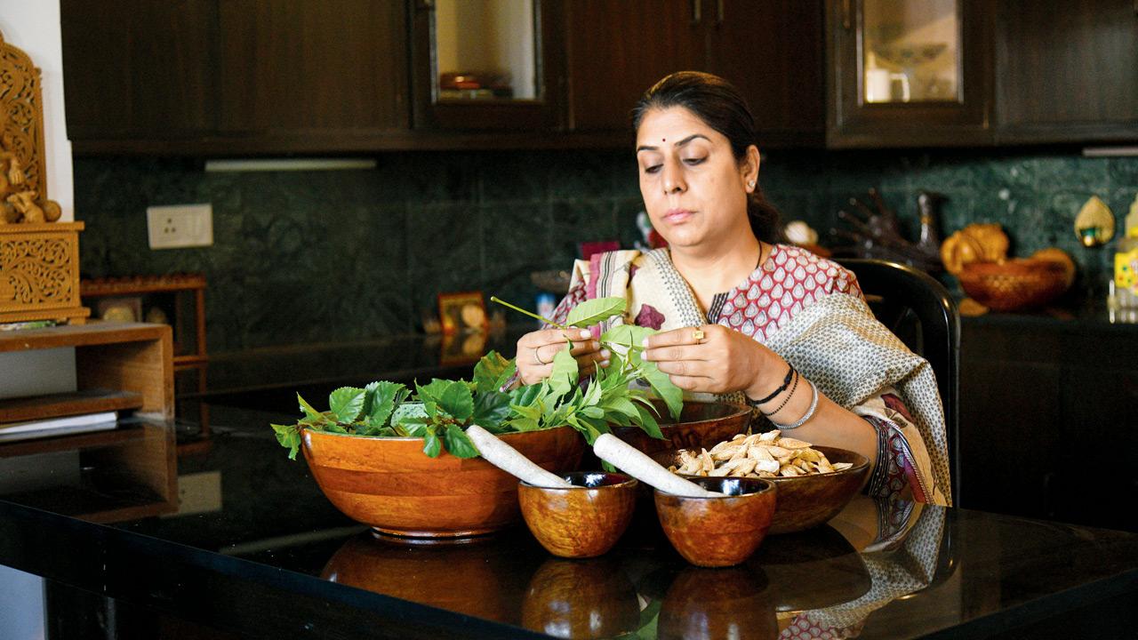 Founder Purvai Jain handpicking the herbs for Anandprash
