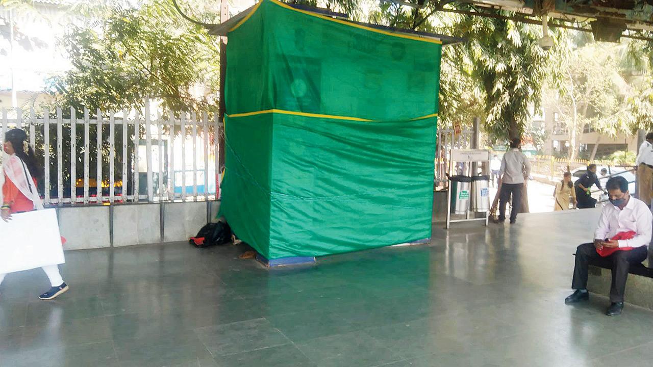 Thane: This disused machine was hidden during a visit by the railway minister last month