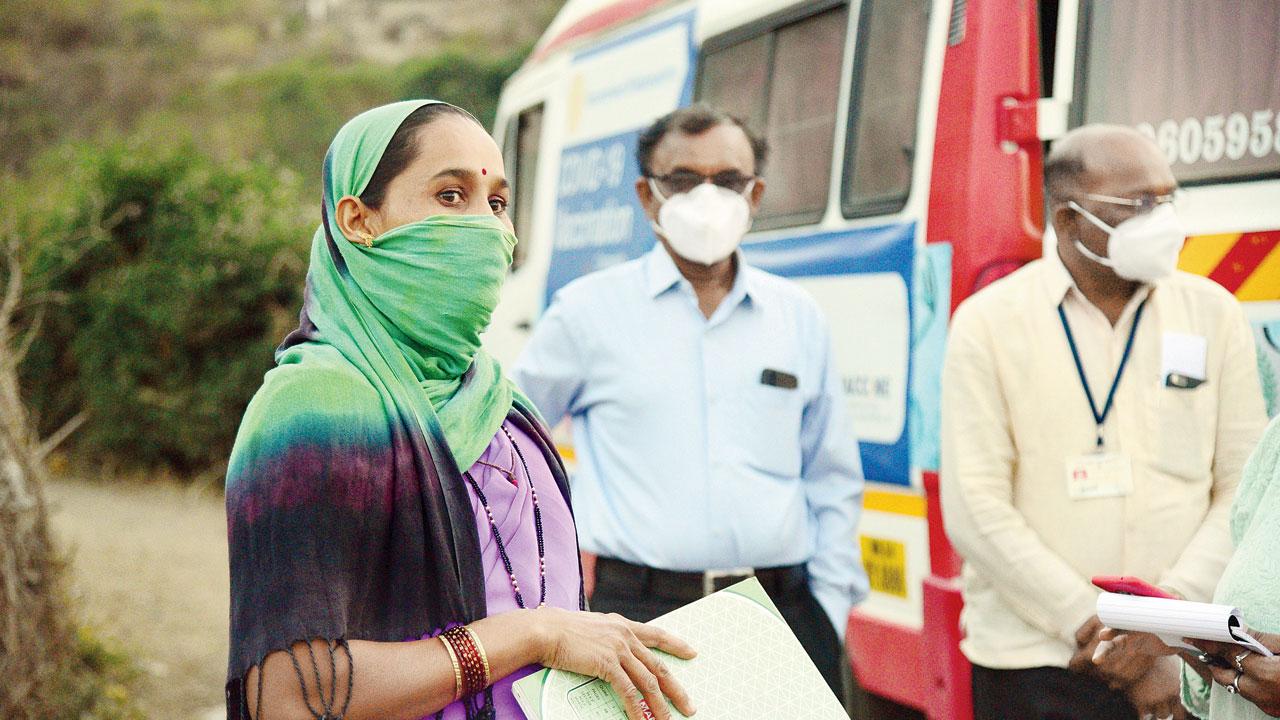 Kamal Choudhary, an ASHA worker, in Hanumant pada, who has been trying to convince villagers to get vaccinated, says that she often gets booed away. “They get violent and even throw stones at us”
