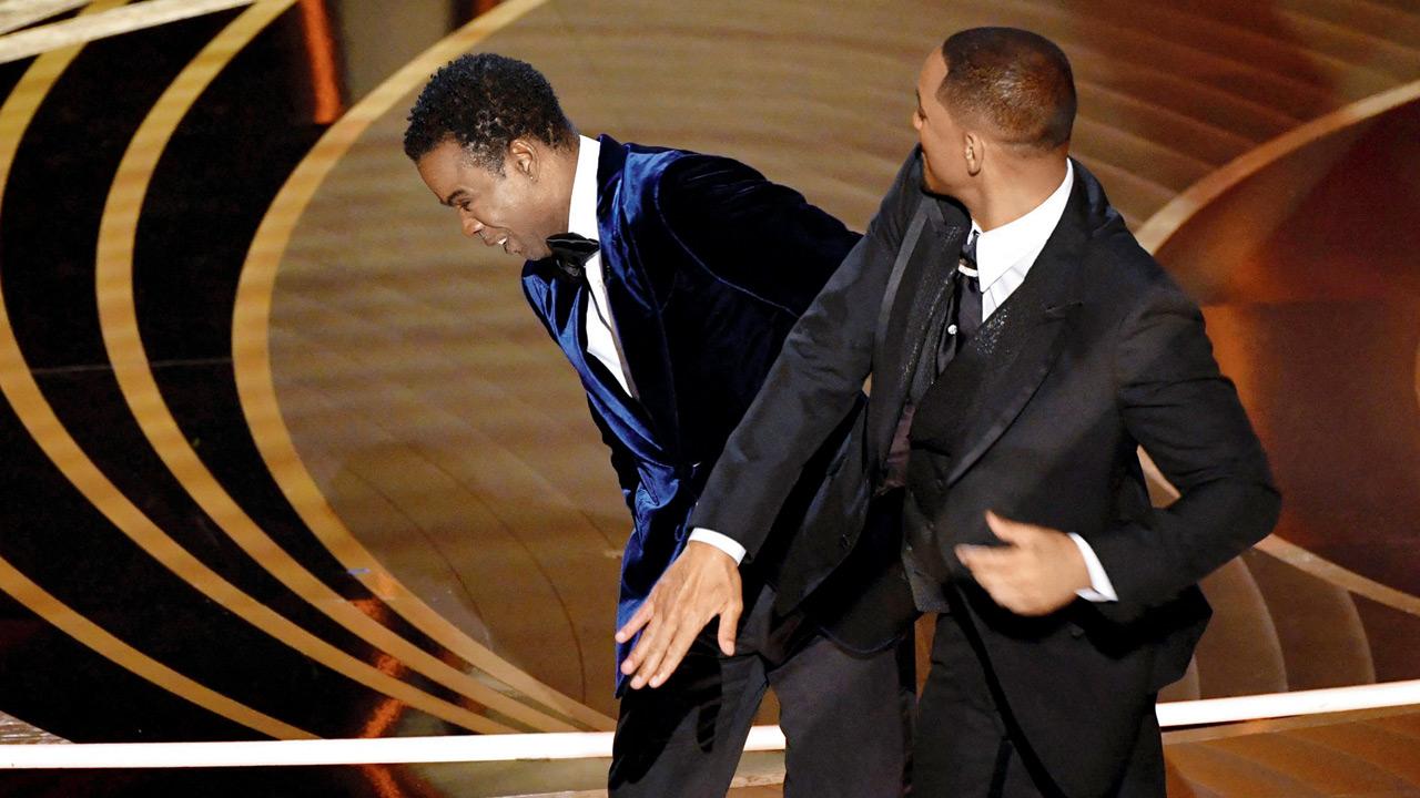 Will Smith slaps Chris Rock onstage during the 94th Oscars. Pic/AFP