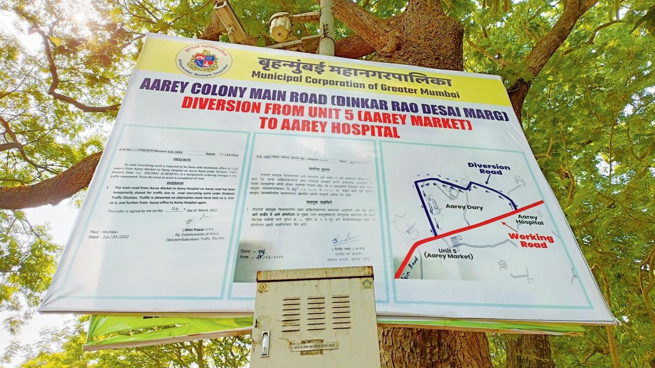 The notice pasted at several places in Aarey Colony, informing motorists of the blocked road and alternative routes