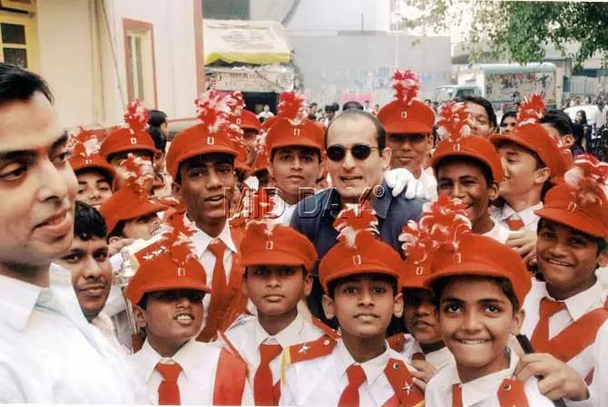 Pictured: Akshaye Khanna with Milind Deora and school cadets at an event.