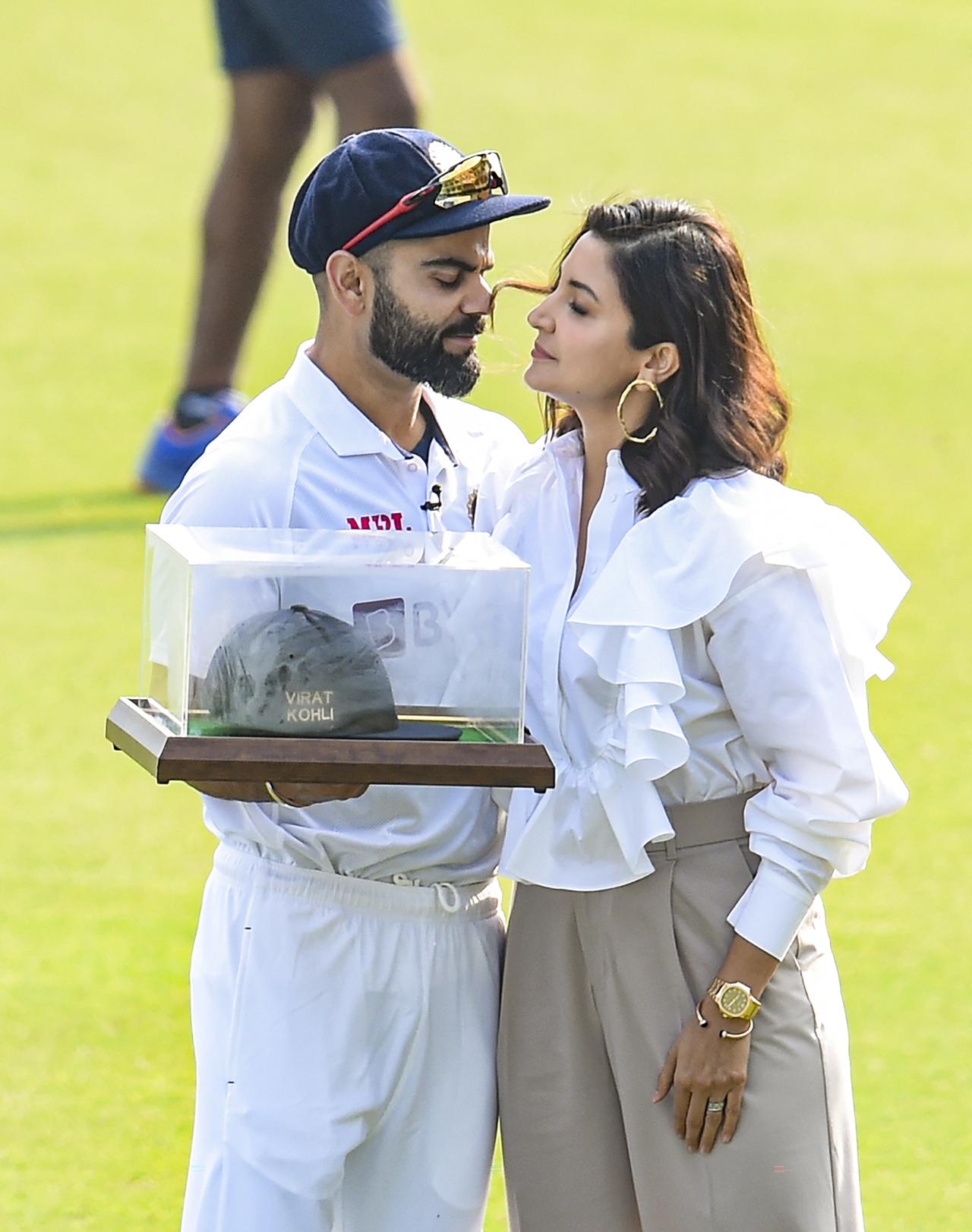 Virat Kohlis wife Anushka Sharma joins him during 100th Test felicitation