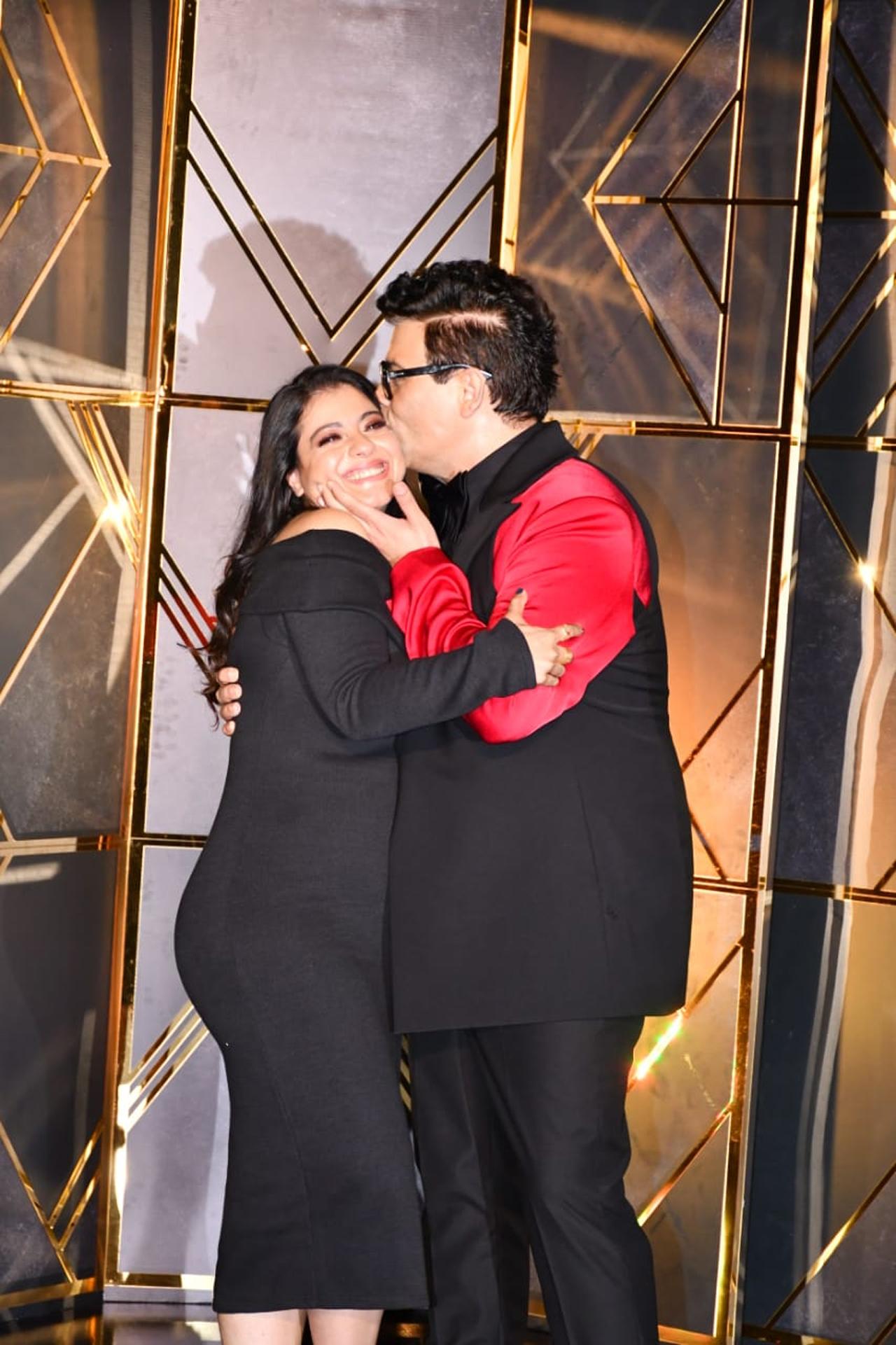 Kajol and Karan Johar stole the show with their endearing friendship in front of the paparazzi. Kajol was seen wearing a black gown for the celebration.