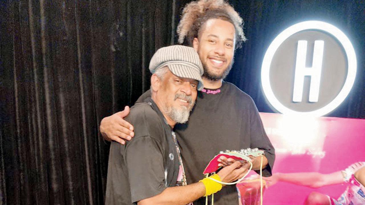 Raul Rocha (left) handing his ghungroo to Akram