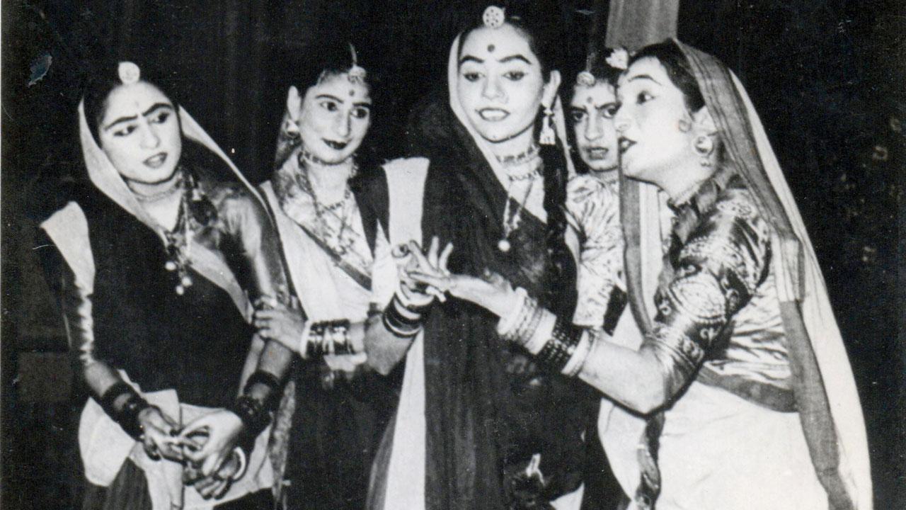  From her most famous and super-hit Gujarati play from 1946—Mena Gurjari—about a young girl who marries a tribal leader. Pathak is on the extreme right