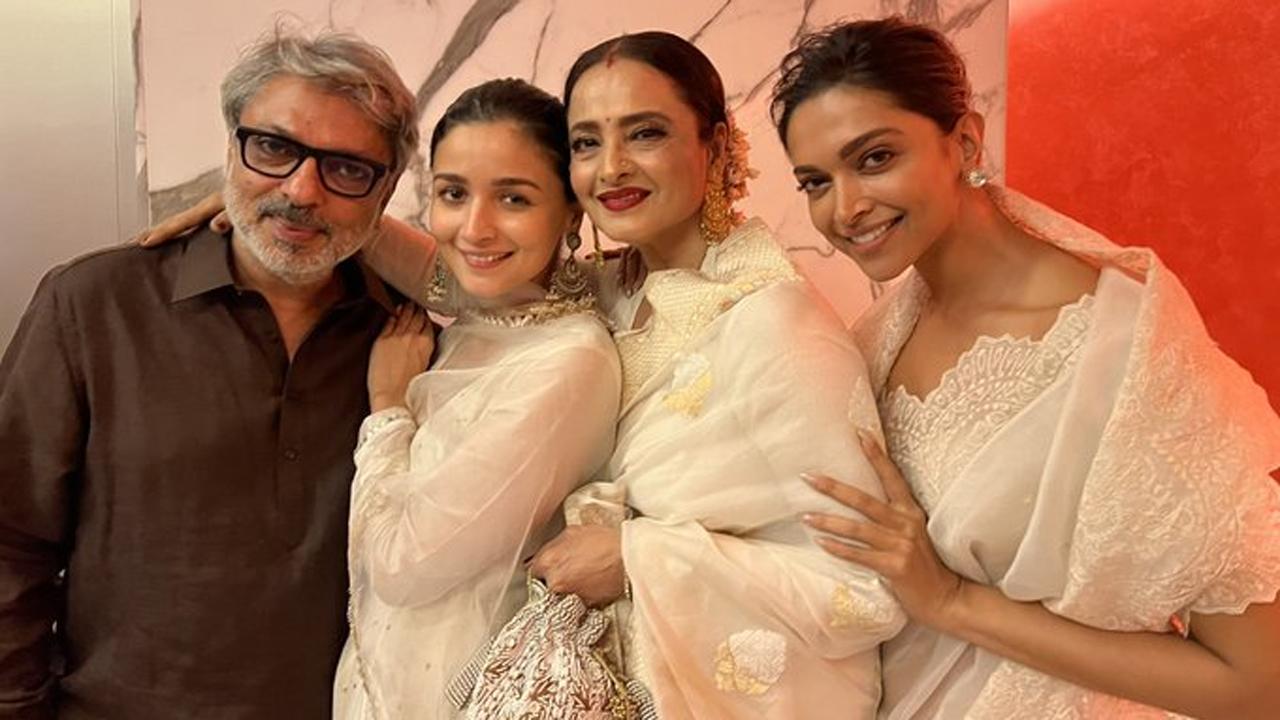 An unseen picture from the premiere of the Sanjay Leela Bhansali directorial 'Gangubai Kathiawadi' recently made its way to the Internet and has gone viral since then. The picture in question has the director posing with actresses Alia Bhatt, Rekha and Deepika Padukone. Read the full story here