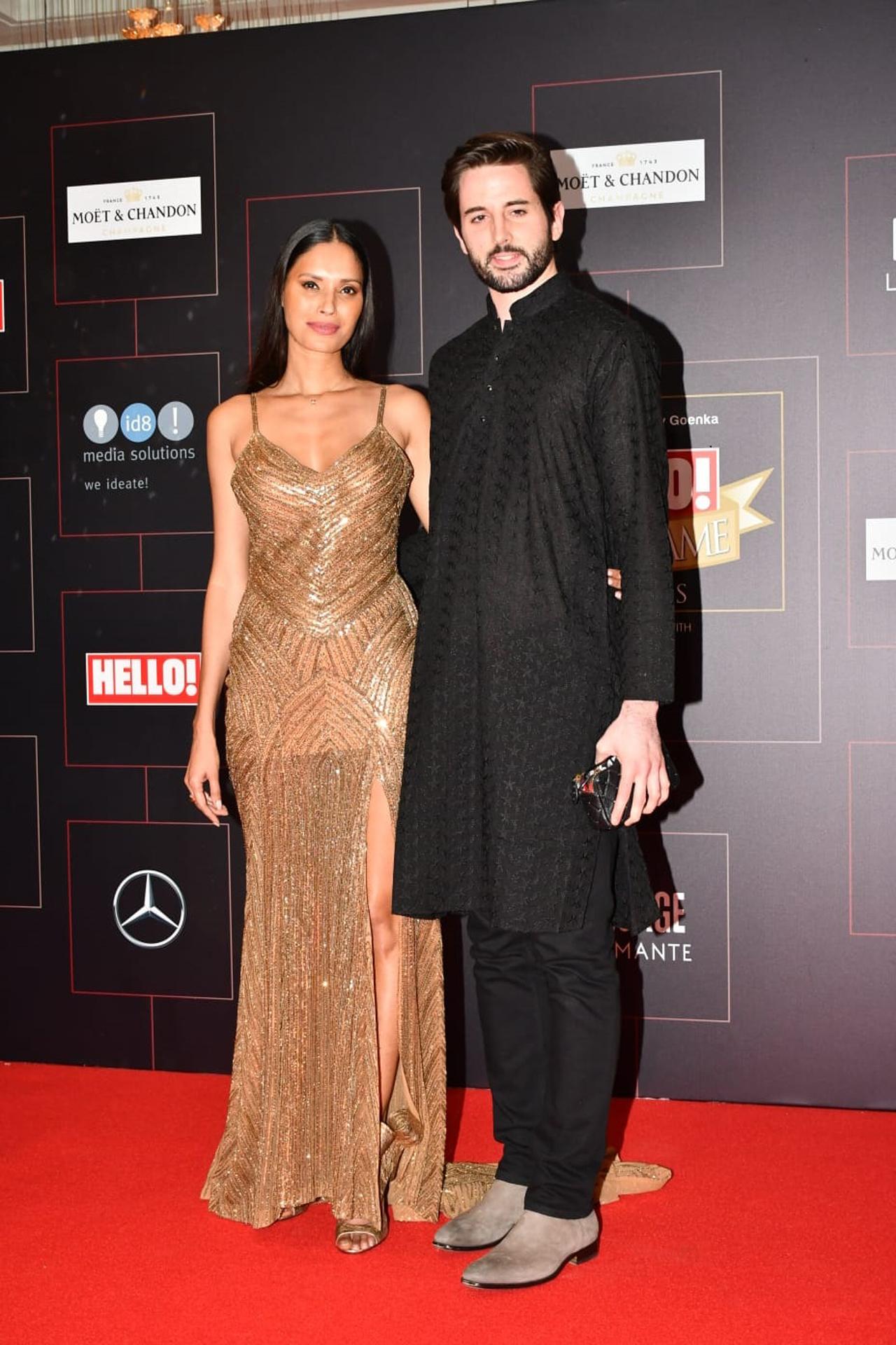 Ujjwala Raut, the popular Indian supermodel, looked ravishing in a golden gown as she walked the red carpet with her friend.