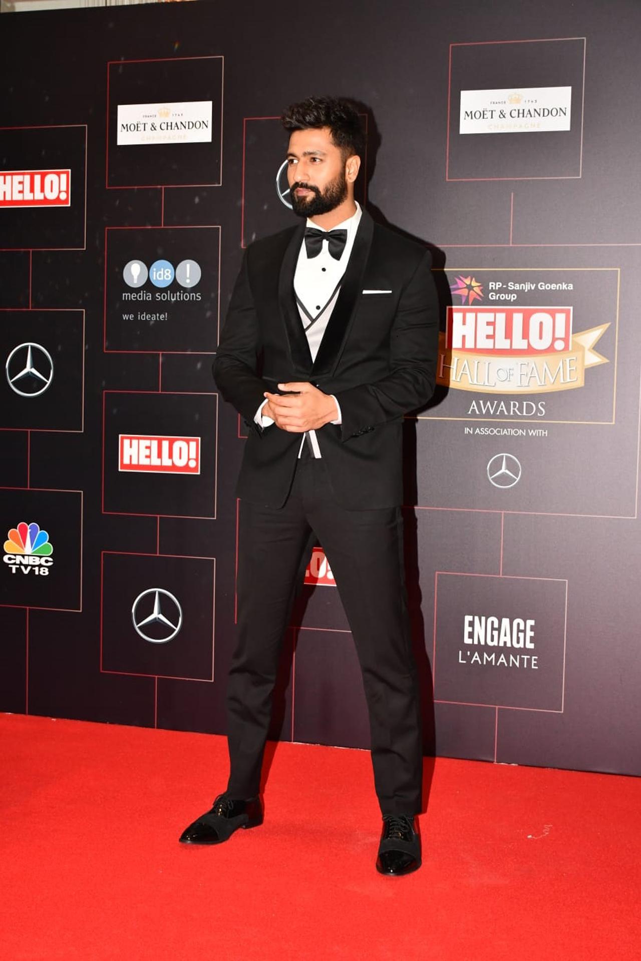 Vicky Kaushal, who also hosted the awards ceremony, opted for a black suit as he walked the red carpet event hosted in the city.
