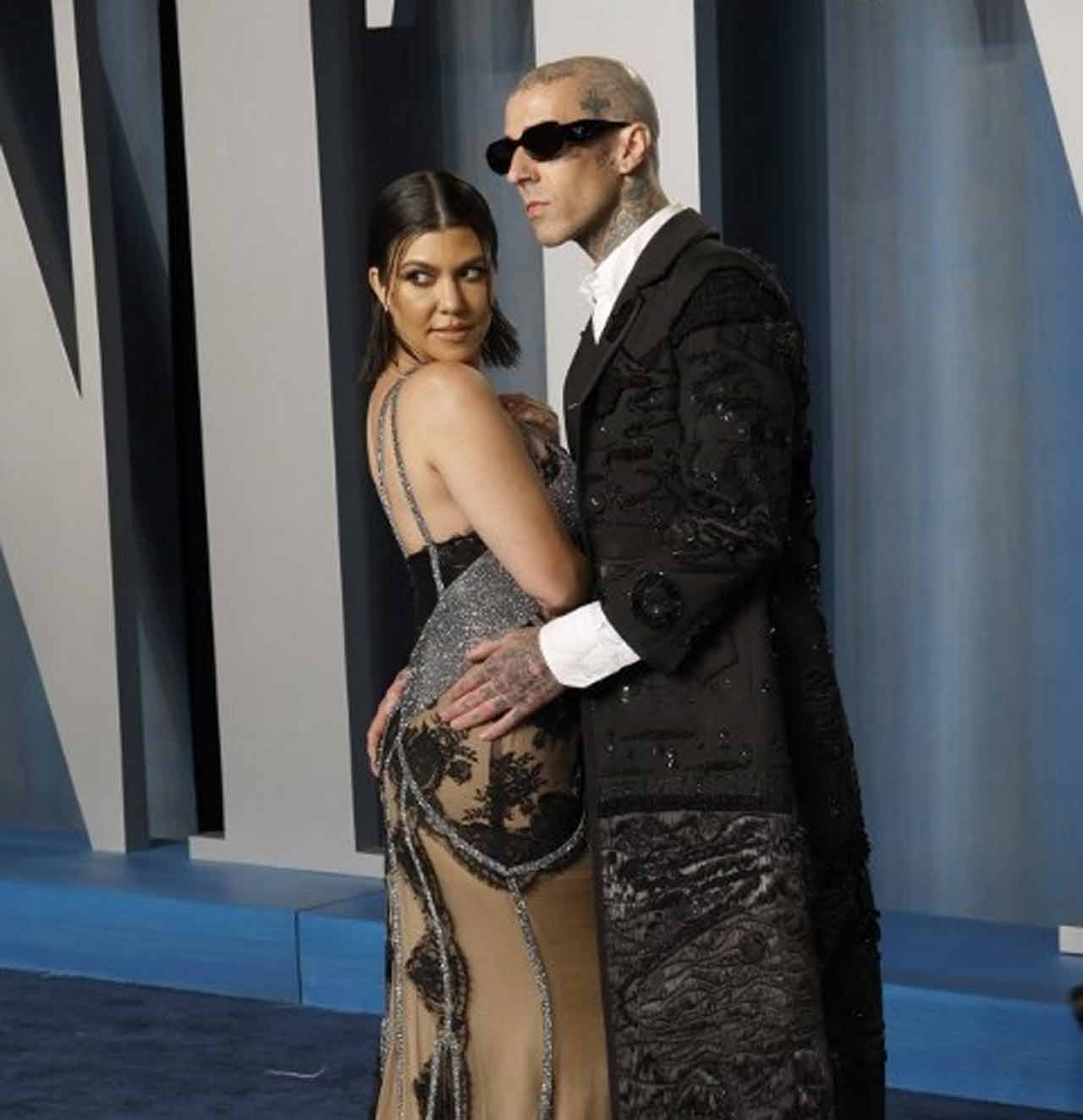 Kourtney Kardashian, Travis Barker posed together at the after party and gave major fashion goals. Kardashian just became the first Kardashian-Jenner family member to attend the Oscars. The 42-year-old star arrived in style to attend the ceremony with her beau and musician Travis Barker. Kourtney and Travis, who got engaged in October 2021, made their Oscars debut on the red carpet in coordinating style. The Poosh founder and her rocker fiance made out for the camera as they modelled matching black looks at the 2022 Oscars.