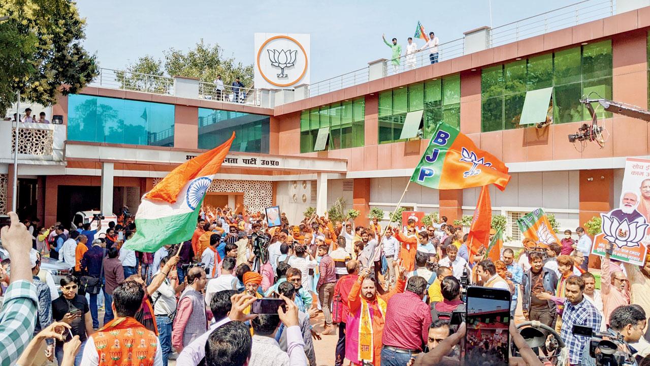 BJP workers celebrate in Lucknow. Pic/Dharmendra Jore