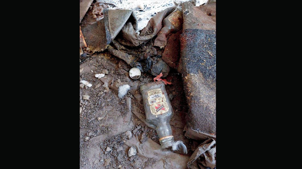 An empty liquor bottle in one of the tents. Pics/Rajesh Gupta