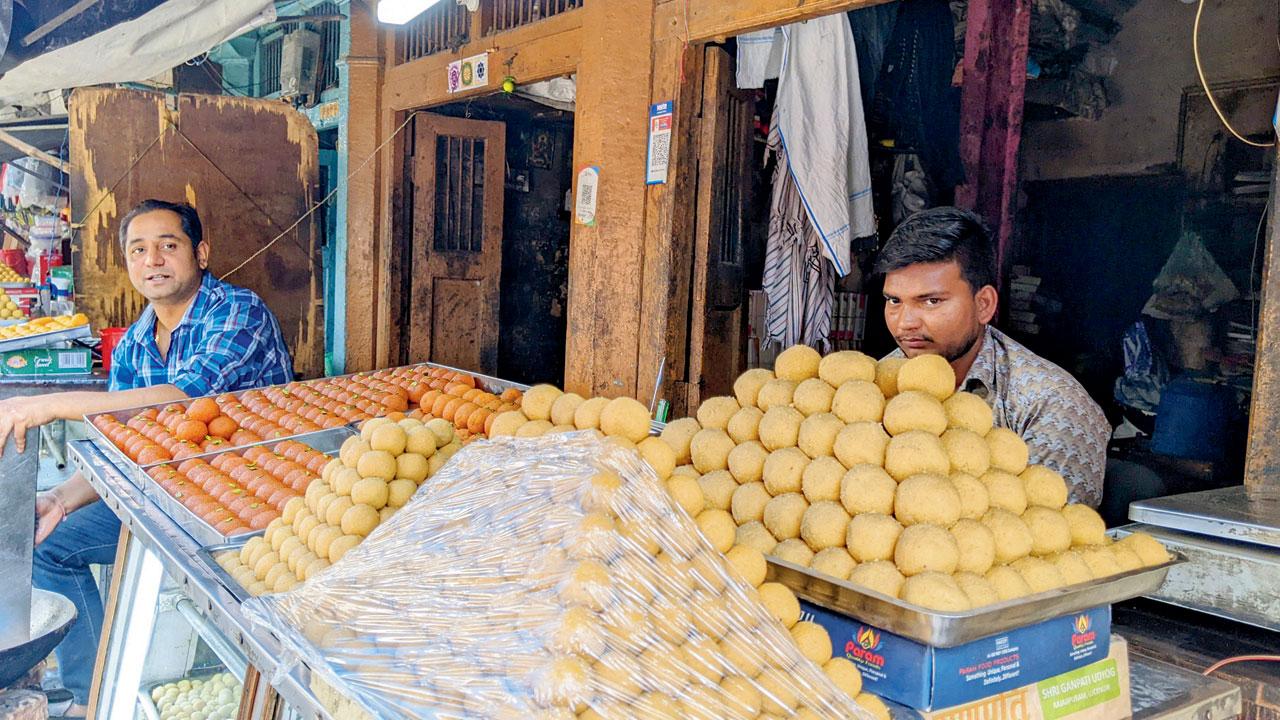 Durgesh Gupta (left) did not have any advance booking for sweets on Wednesday