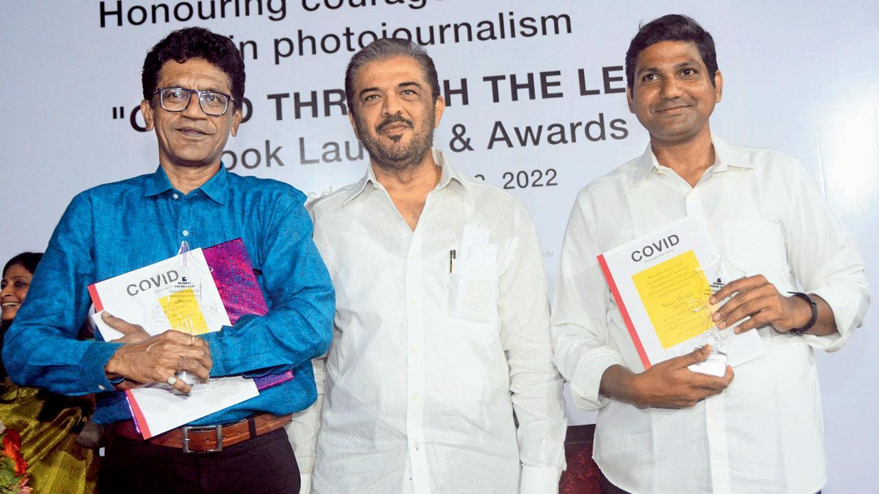 Mid-day photographers receive Covid Photo Contest award from state sports minister Sunil Kedar