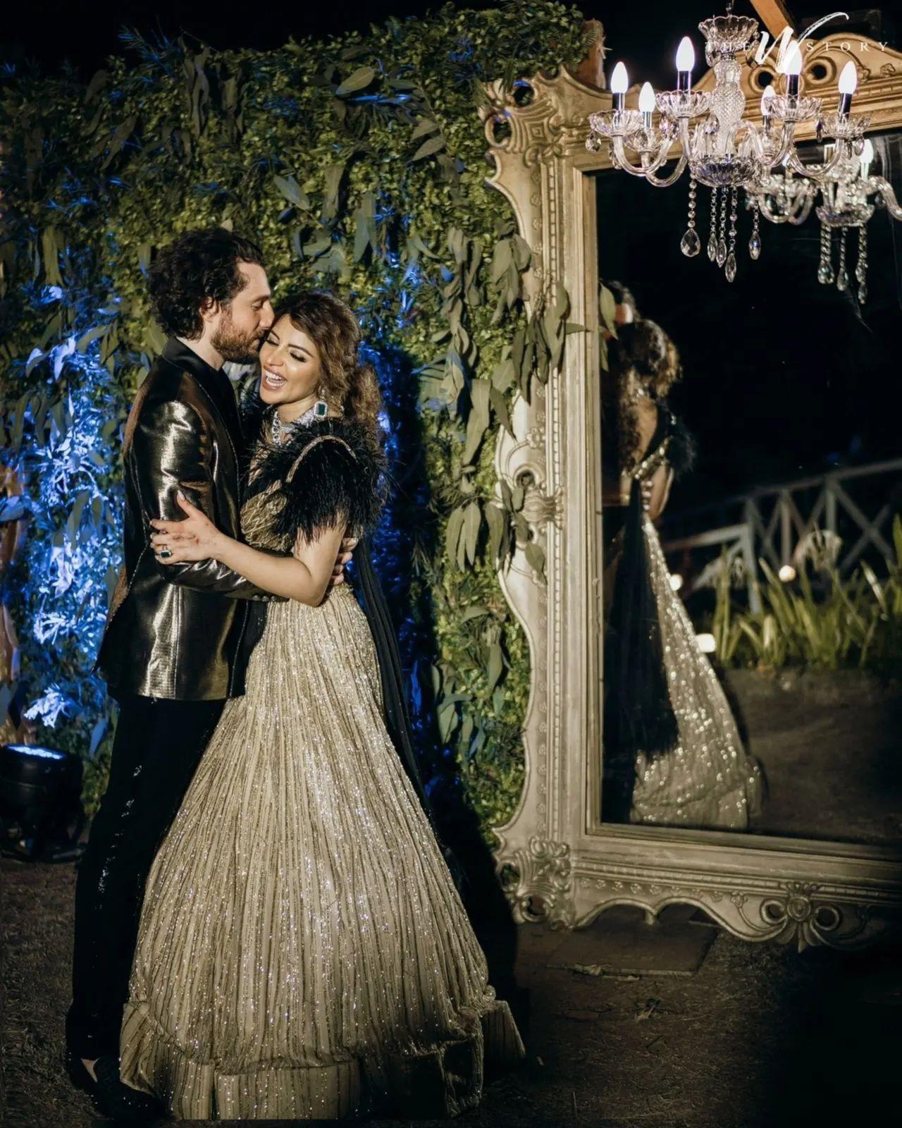 After the wedding, they also hosted a fairytale reception, where Shama Sikander was seen wearing a black and golden gown. The groom complimented Shama's look with a velvet black tuxedo.
