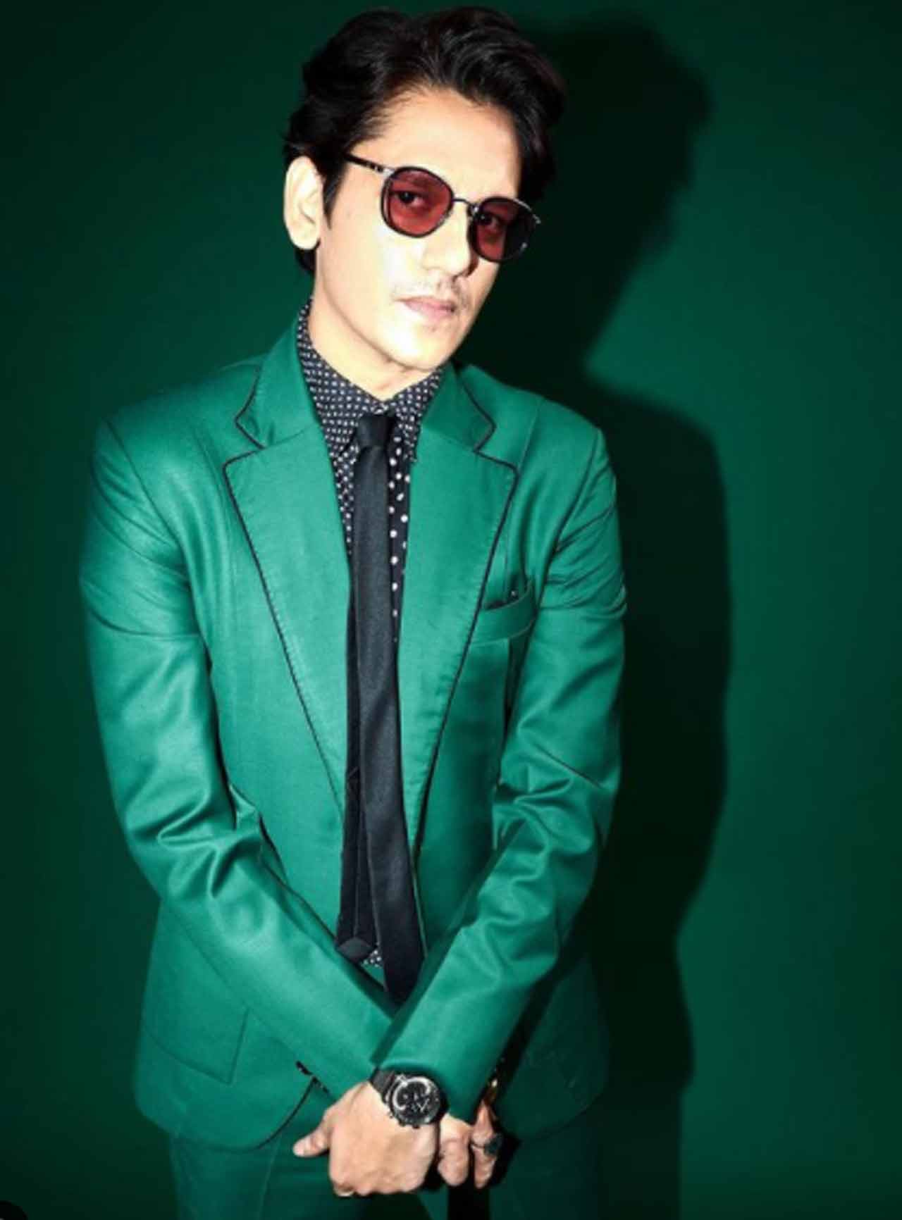 The actor shared this picture with his fans wearing a green coat and posing agasint the background of green wall, making others go green with envy with his style.