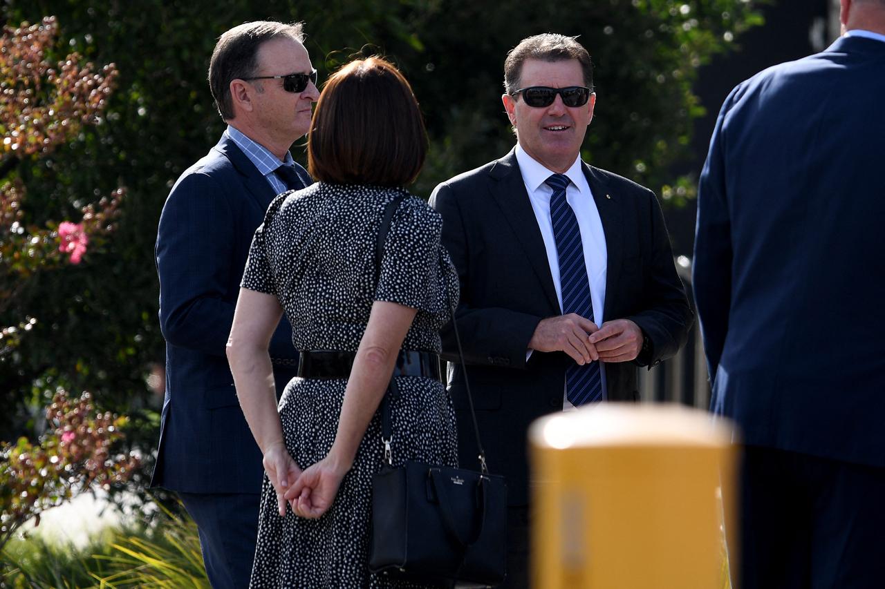 Former Australian cricketers Mark Waugh (L) and Mark Taylor (R) arrive for a private memorial service for Australian cricket superstar Shane Warne in Melbourne