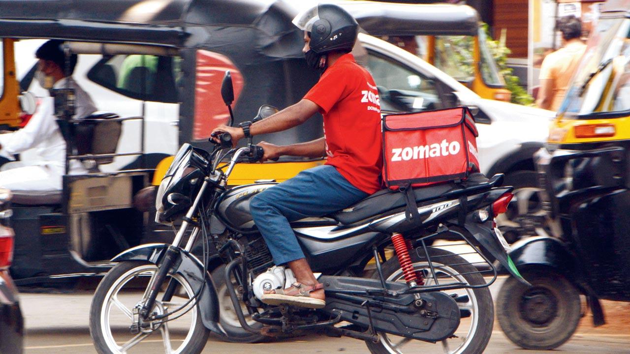 A Zomato delivery boy at Malad on Wednesday. Pic/Satej Shinde