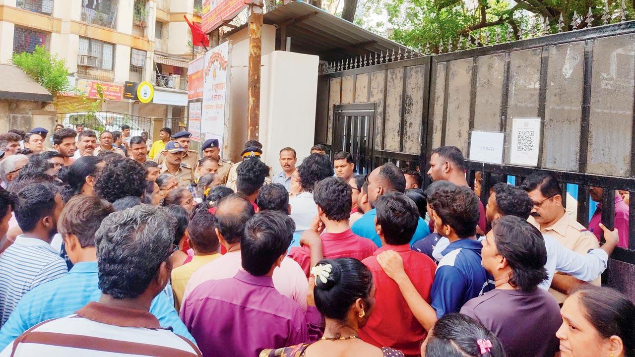 Protesters demonstrate outside AEML’s Tilak Nagar plant