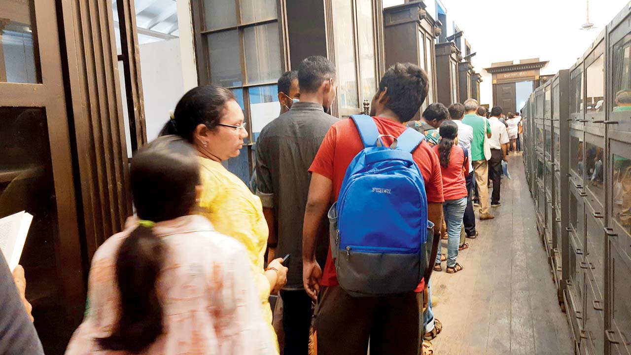 (Top, above) The long line of bibliophiles panning age groups wormed its way from the entrance to the Durbar Hall, which was the venue for the books sale 