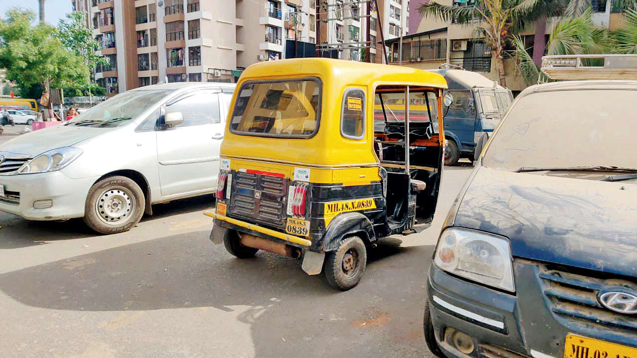 The auto that accused Omkar Pawar was driving on the day of the alleged murder of (left) Pradeep Mejiyatar. Pics/Hanif Patel