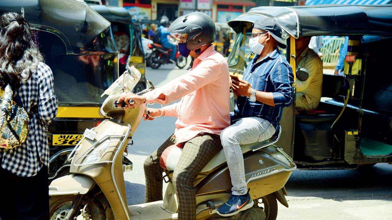 Mumbai Bike taxi aggregator Rapido introduces helmets for pillion