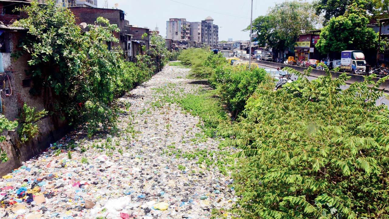 A clogged drain in Dharavi. File pic/Suresh Karkera