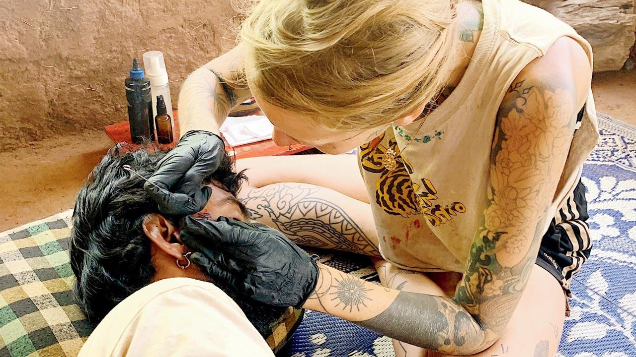 Corrie has opened the commune for tattoo sleepovers, where one can stay, and get a custom handpoke tattoo by her