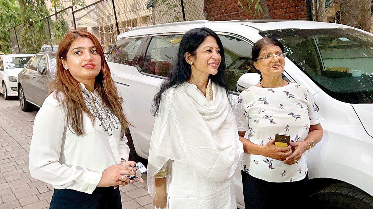 Indrani with lawyer Sana Raees Khan (left) and advocate Edith Dey at her Worli home. Pic/Faizan Khan