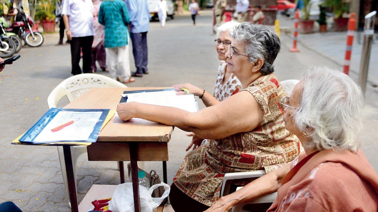 Senior citizens volunteer at a poll booth. File pic/Bipin Kokate
