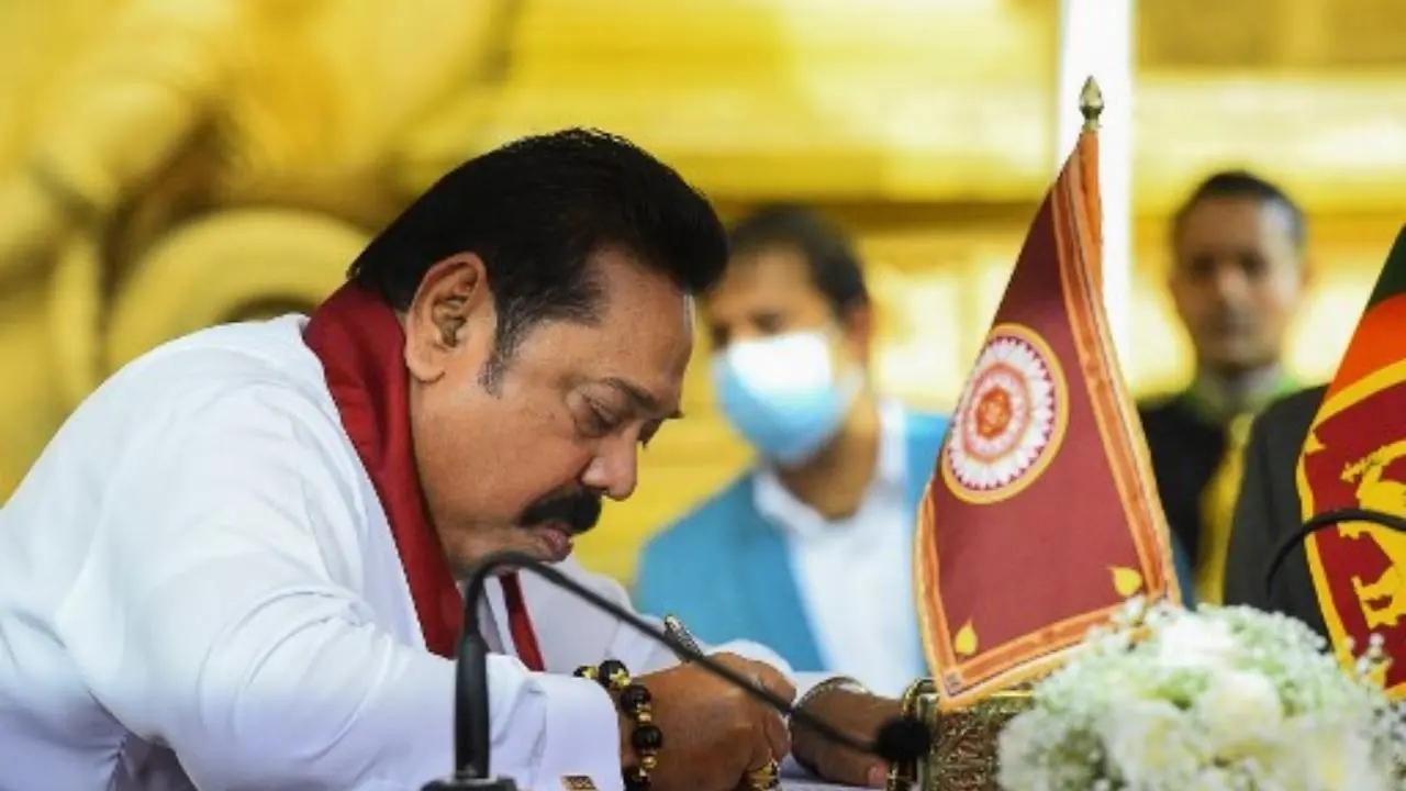 Sri Lanka's ex-PM Mahinda Rajapaksa makes 1st public appearance since holed up in naval base