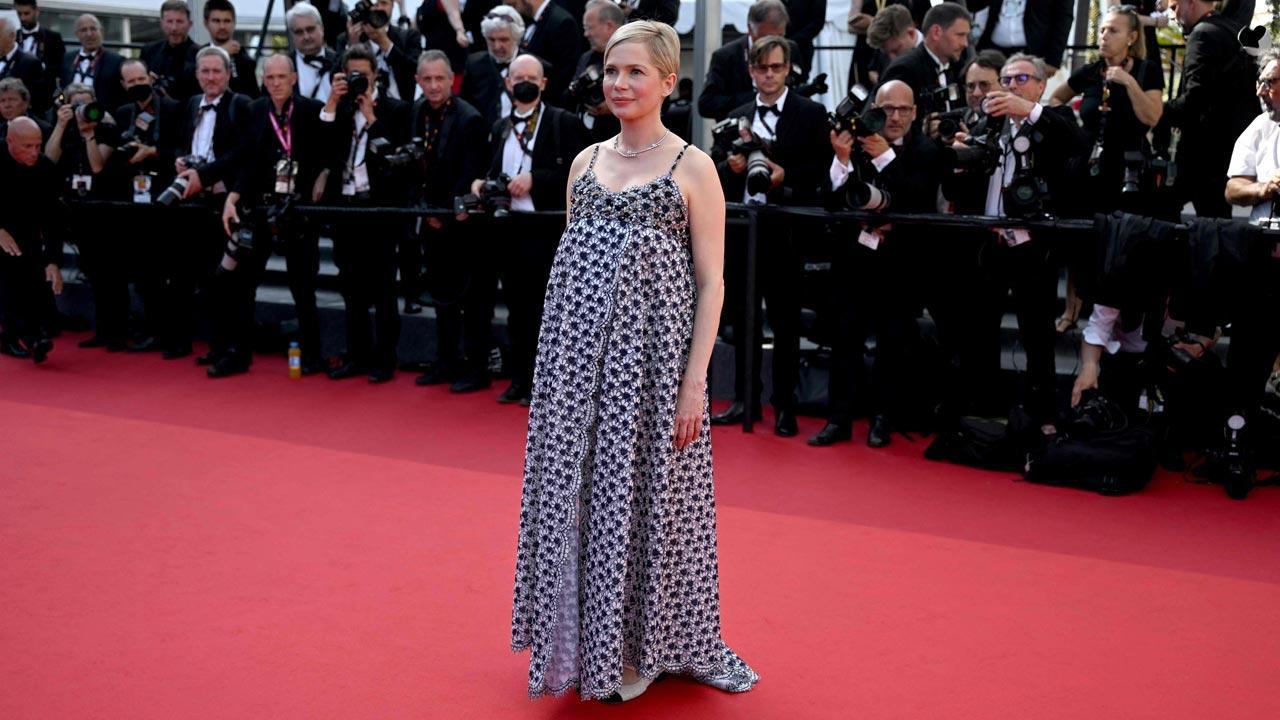 Michelle Williams flaunts her baby bump at Cannes 2022