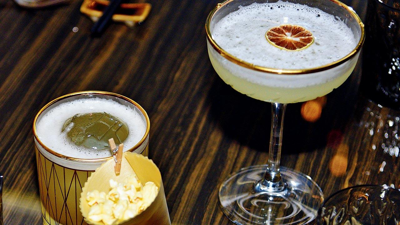 (From left) Smoked popcorn sour; the classic pisco sour. Pics/Pradeep Dhivar