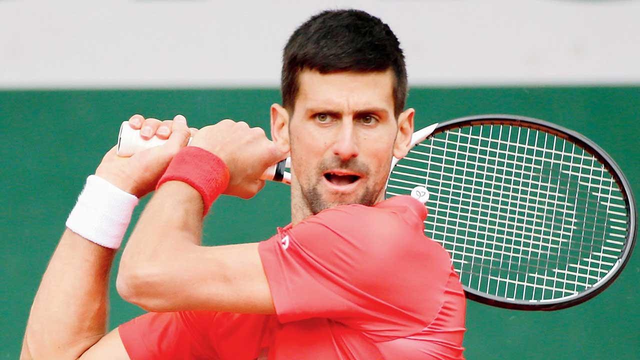 No.1 Djokovic inches closer to Nadal clash