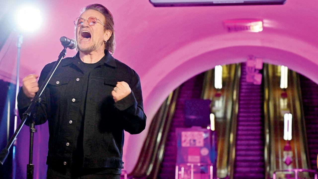 Bono, Irish singer-activist, and lead vocalist of rock band U2, performs at a subway station which is a bomb shelter in Kyiv, on Sunday
