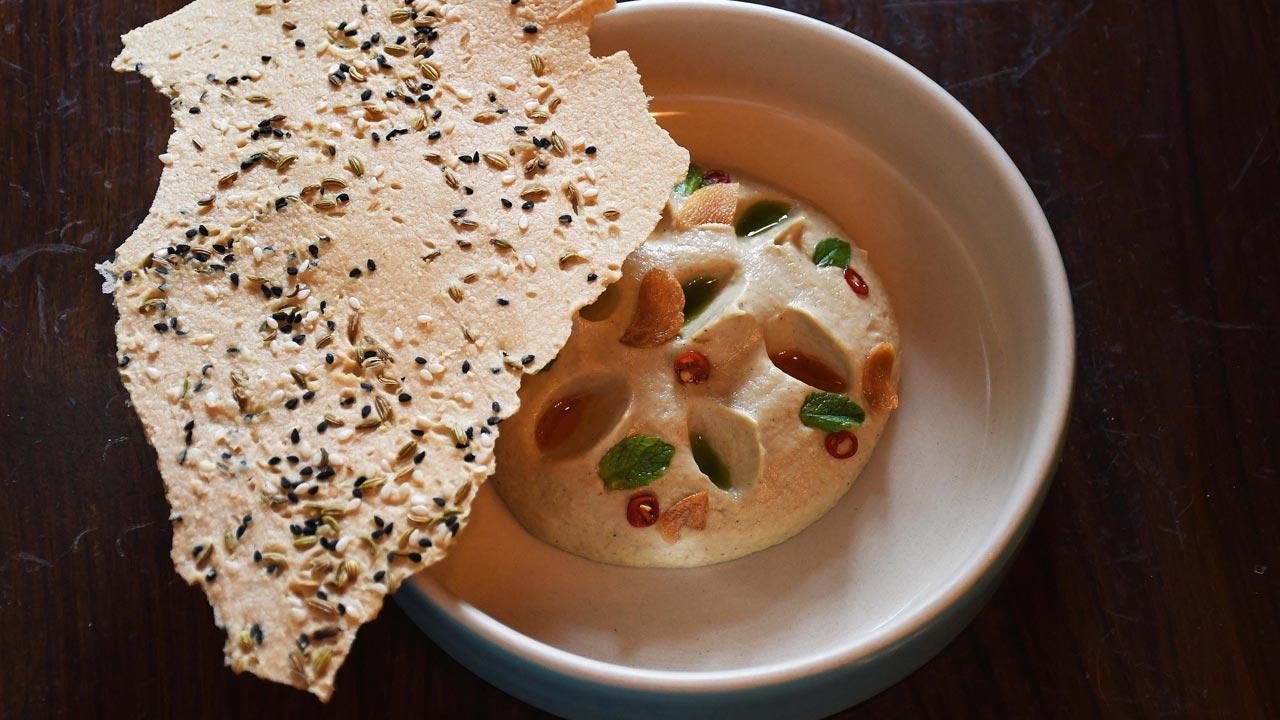 His baigan chokha with sattu  papdi, tomato oil and pickled chillies, a technique forward dish inspired by the traditional litti chokha