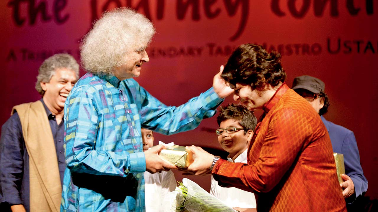 Sharma with flautist Rakesh Chaurasia